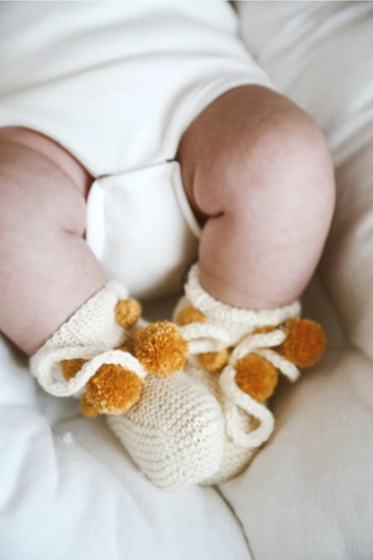Beige with pompom knit booties baby