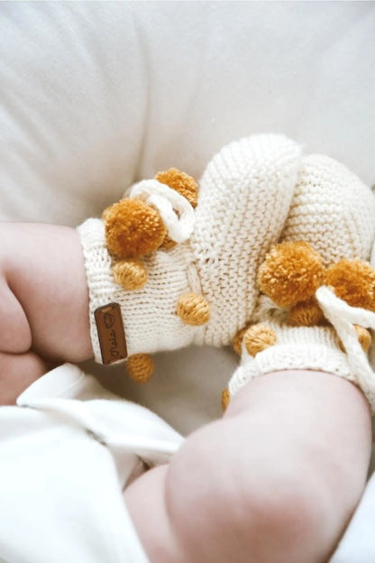 Beige with pompom knit booties baby